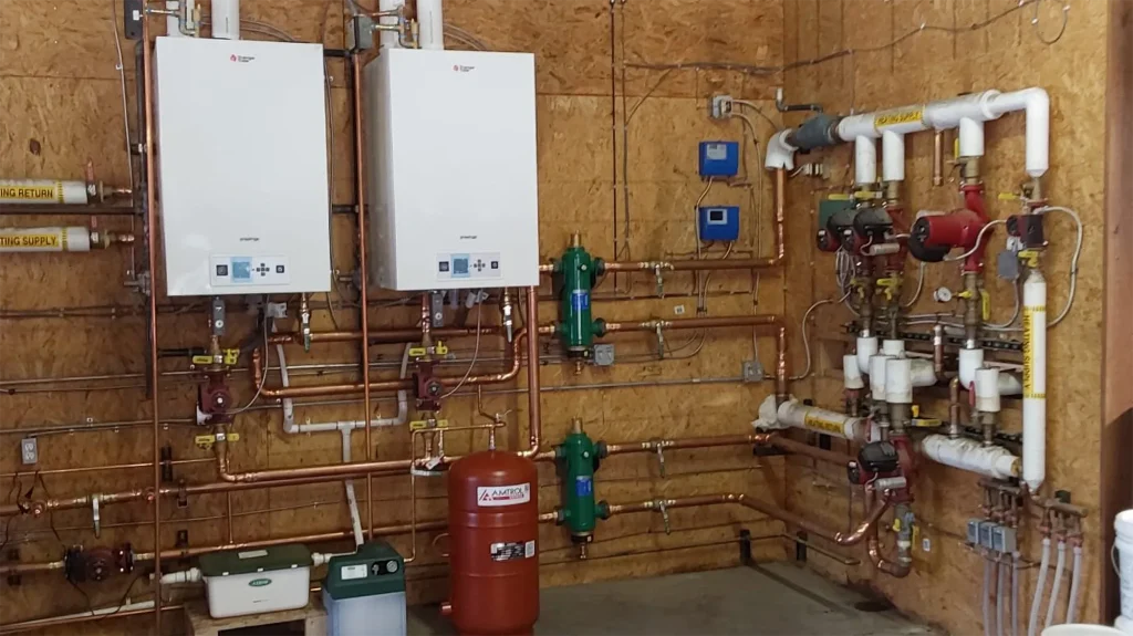 Commercial boiler replacement in Granby Colorado with three high-efficiency boilers installed by Grand Lake Plumbing and Heating