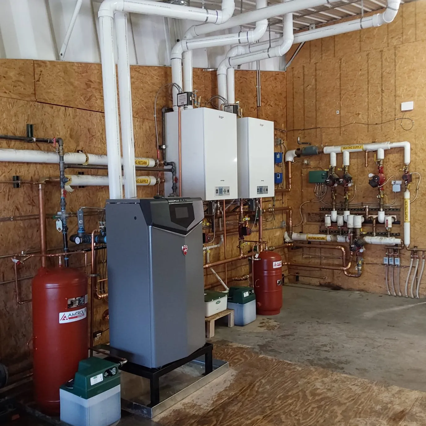 Completed commercial boiler replacement in Granby Colorado with three high-efficiency boilers and hydronic heating components