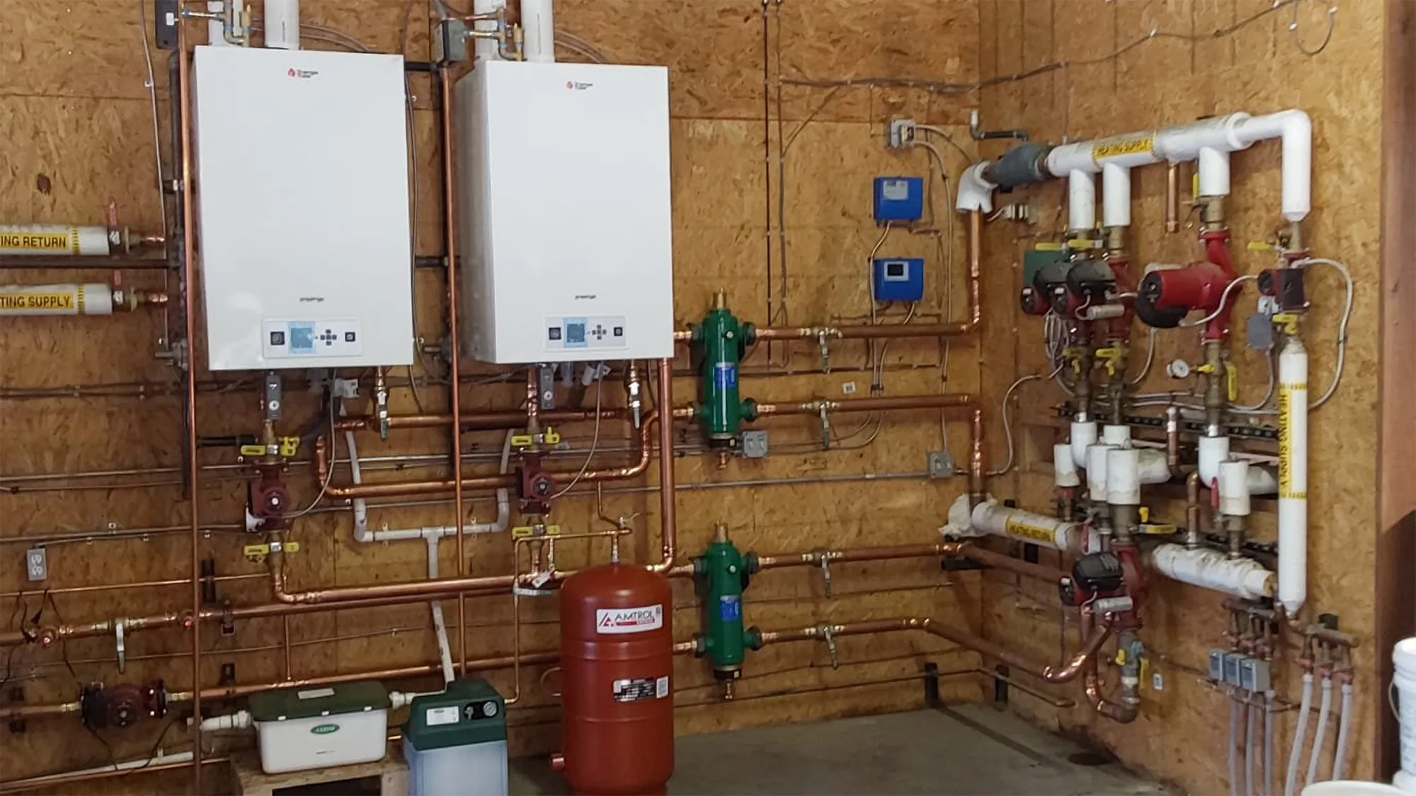 Commercial boiler replacement in Granby Colorado with three high-efficiency boilers installed by Grand Lake Plumbing and Heating Commercial boiler replacement in Granby Colorado with three high-efficiency boilers installed by Grand Lake Plumbing and Heating