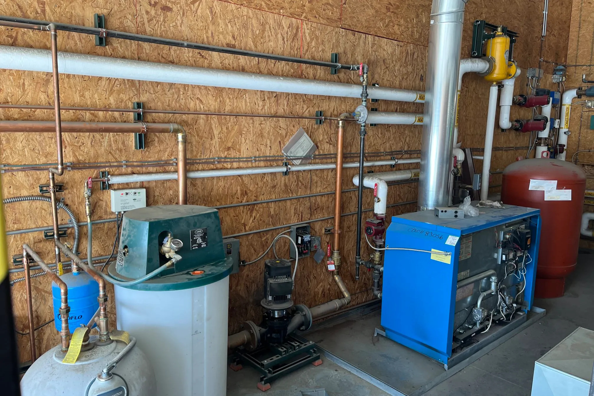 Original cast iron commercial boiler before replacement at Mountain Parks Electric in Granby Colorado
