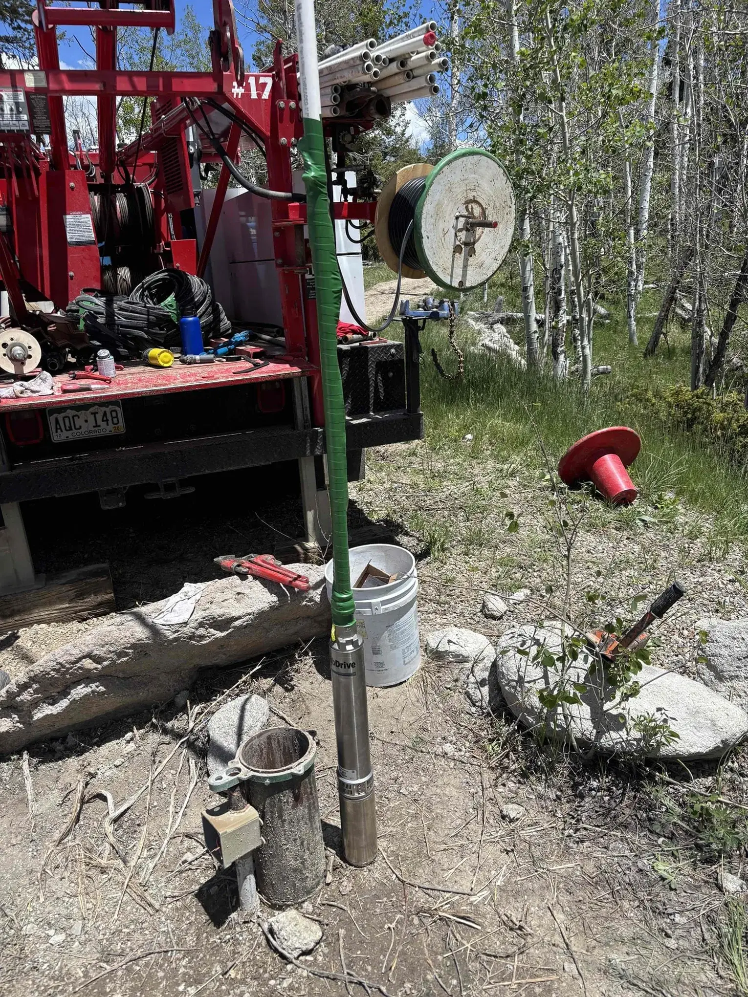 New Franklin Electric submersible well pump staged beside the service rig in Kremmling, Colorado