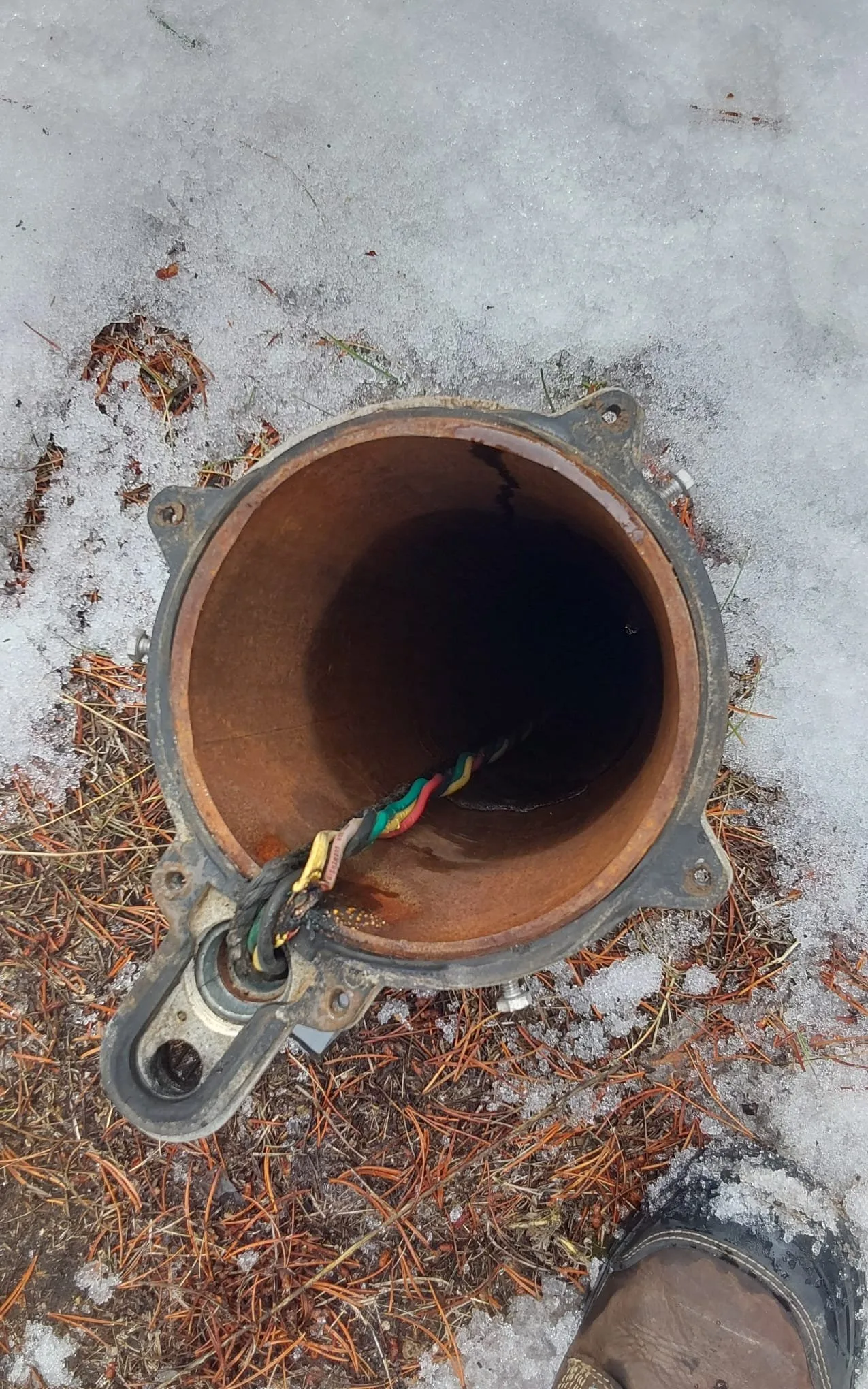 Well casing and seal fitting during a well pump replacement in Tabernash, Colorado
